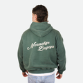 Green hoodie with 'Normalize Bogeys' text on the back 