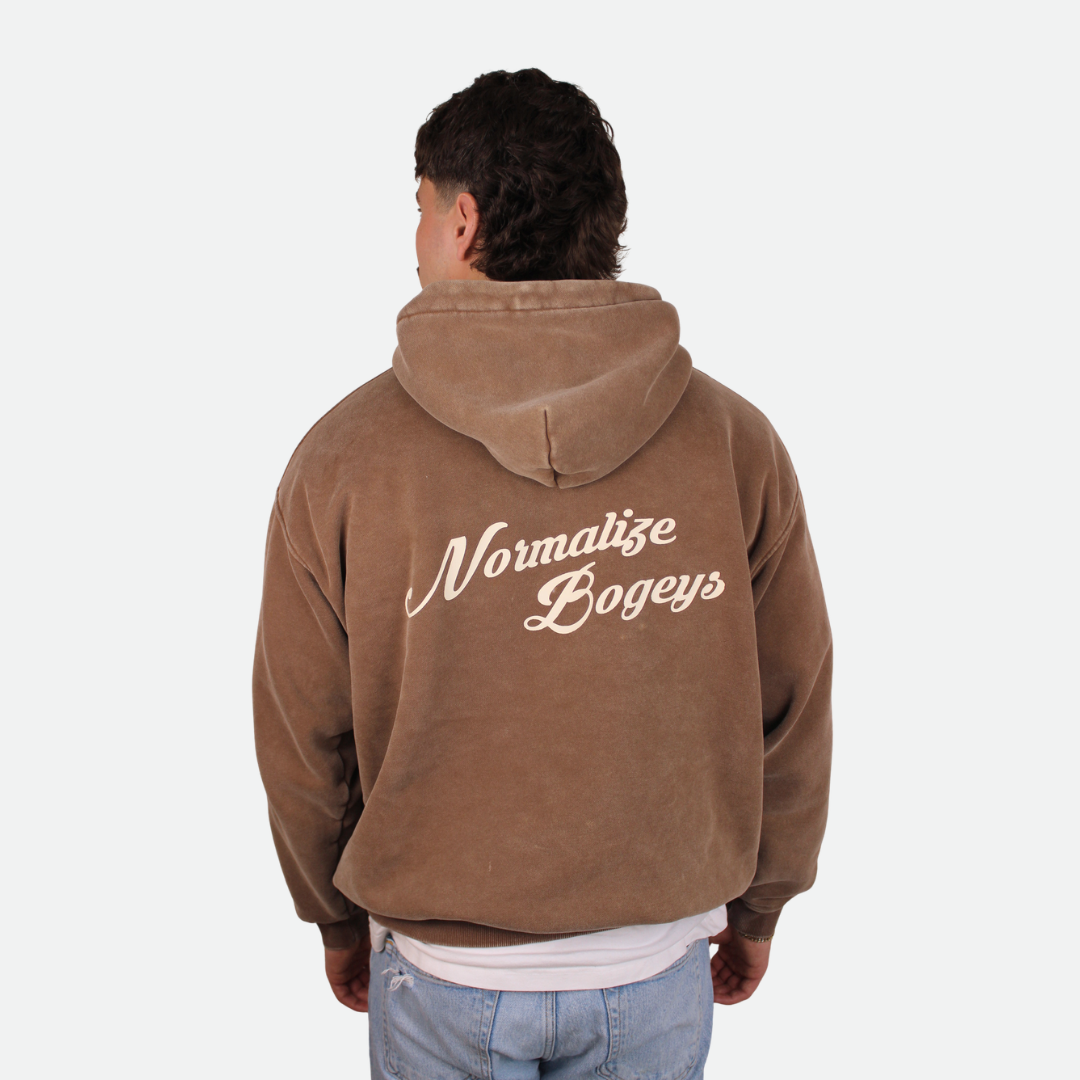 Brown hoodie with 'Normalize Bogeys' text on the back