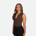 Brown sleeveless golf bodysuit with collar and zipper