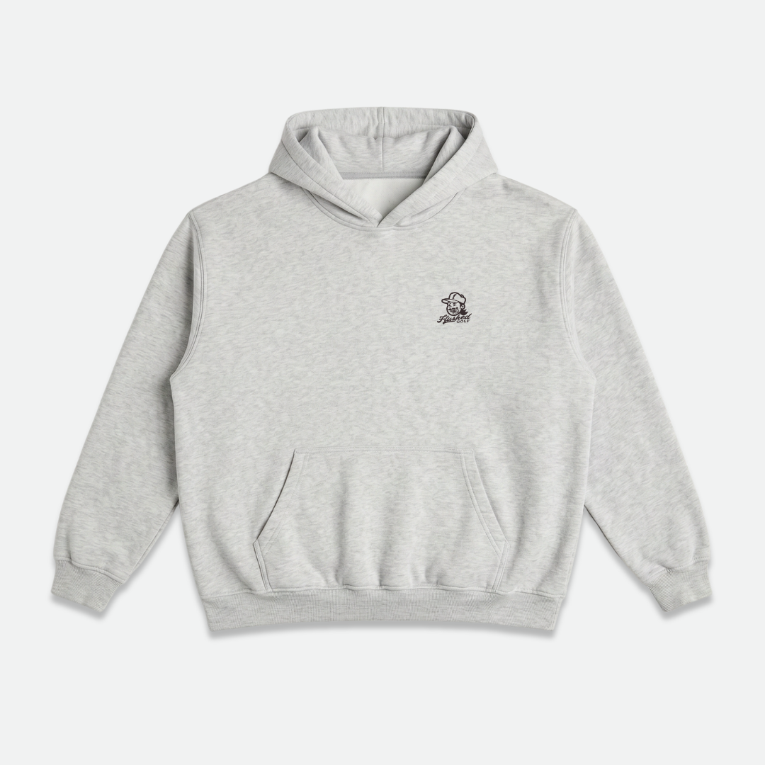 A light heather grey hoodie, featuring the phrase 'Normalize Bogeys' printed in a cursive script across the back.
