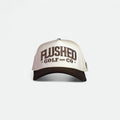 Flushed Golf & Co golf hat with embroidered logo and brown brim, front view