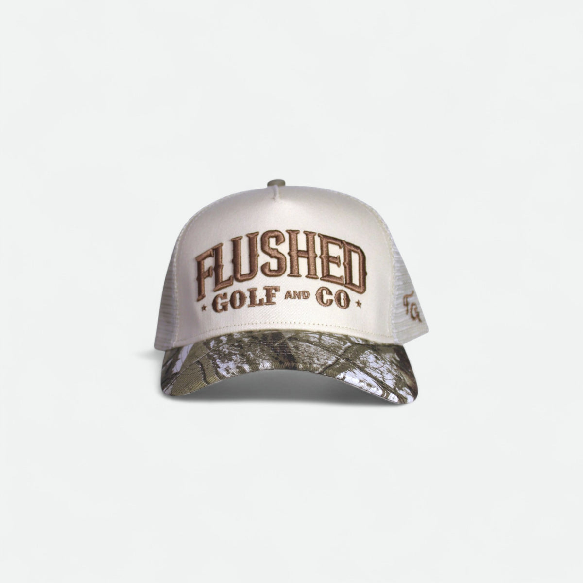 Flushed Golf & Co mesh trucker hat with embroidered logo and camo brim, front view
