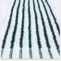 Close-up of a white caddy golf towel with green vertical stripes on a white background