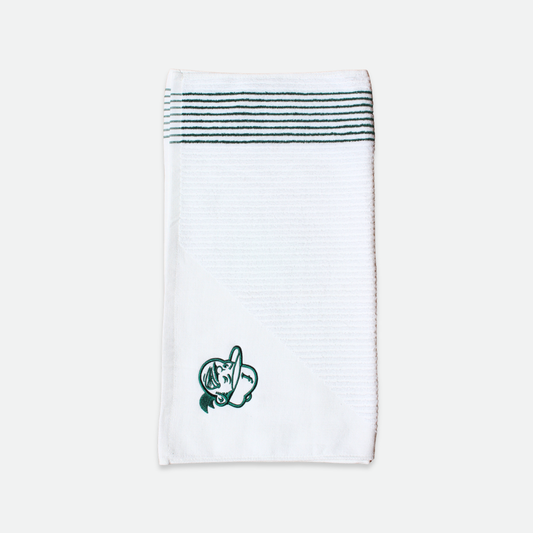 White golf towel with green stripes and a green flushed golf mascot logo on a white background