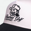 Close-up of embroidered Flushed Golf logo on Classic golf hat with black brim
