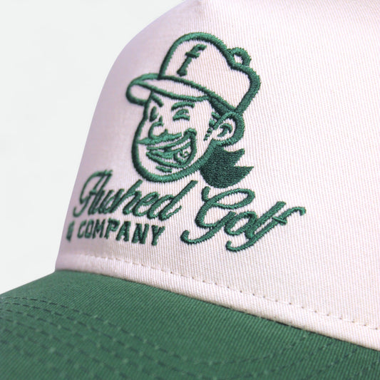 Flushed Golf Classic snapback golf hat with green brim, side view