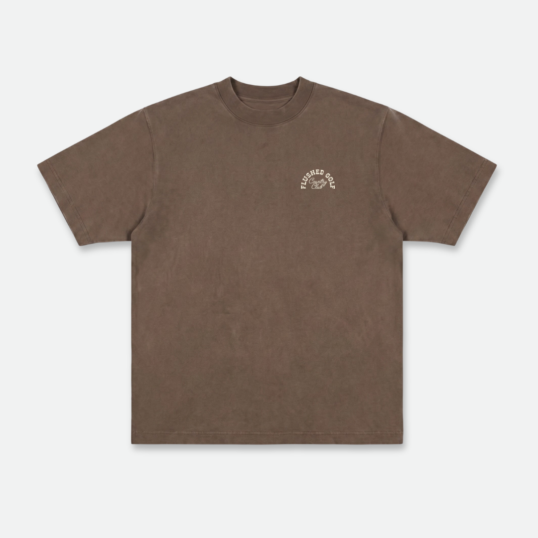 Brown heavyweight cotton country t-shirt with a small logo on a white background