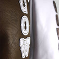 Leather patch logo detail on Flushed Golf His & Hers headcover