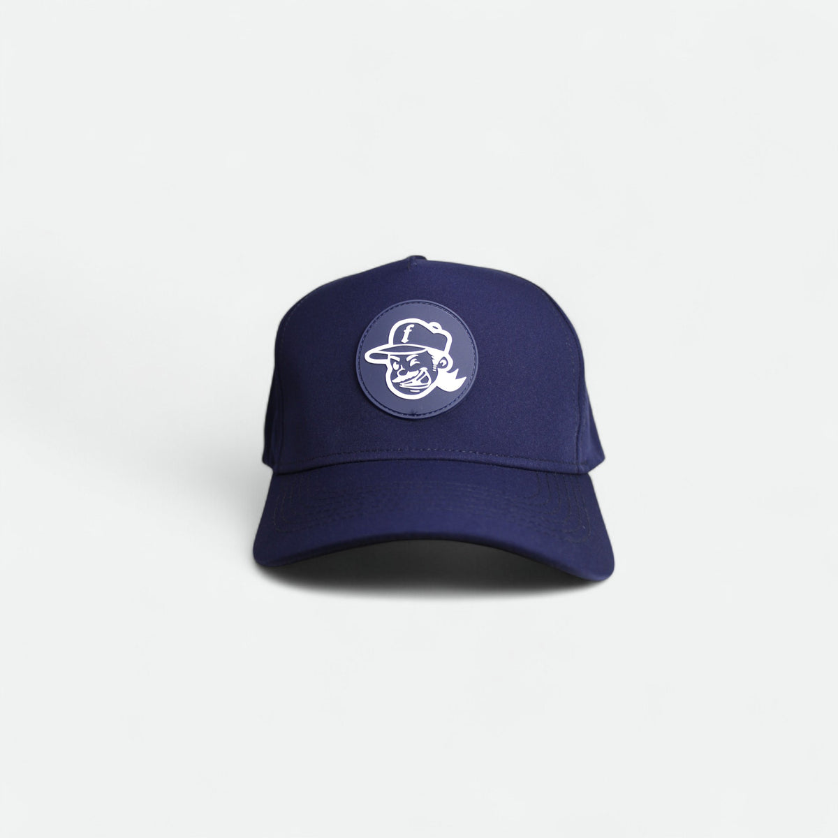 Flushed Golf Mascot golf hat in navy with silicone mascot patch, front view