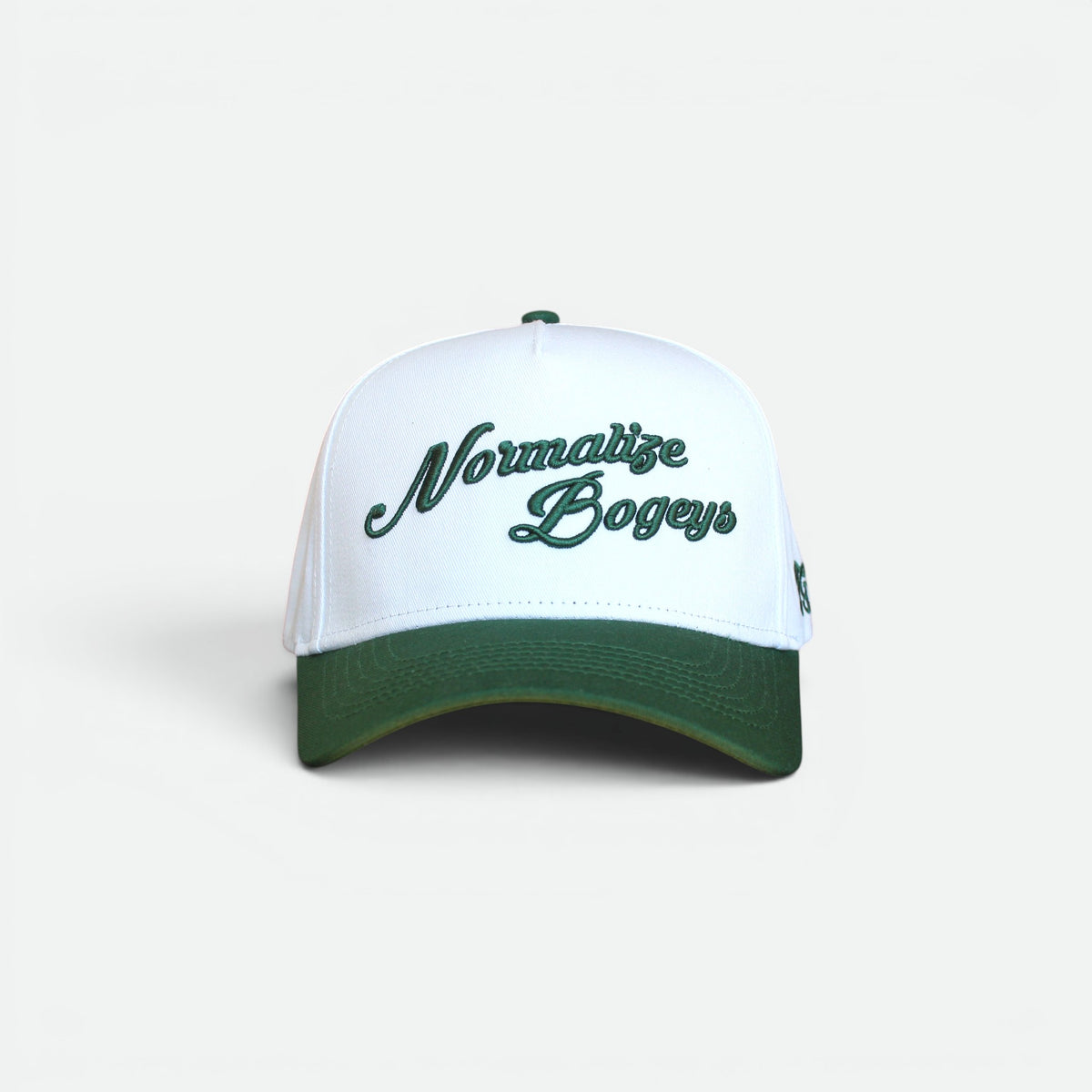 Normalize Bogeys golf hat with embroidered script and green brim by Flushed Golf
