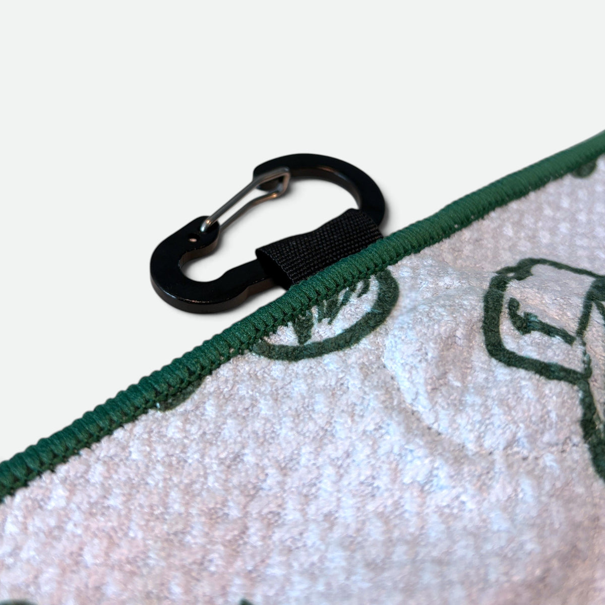 Carabiner clip on green Normalize Bogeys waffle golf towel