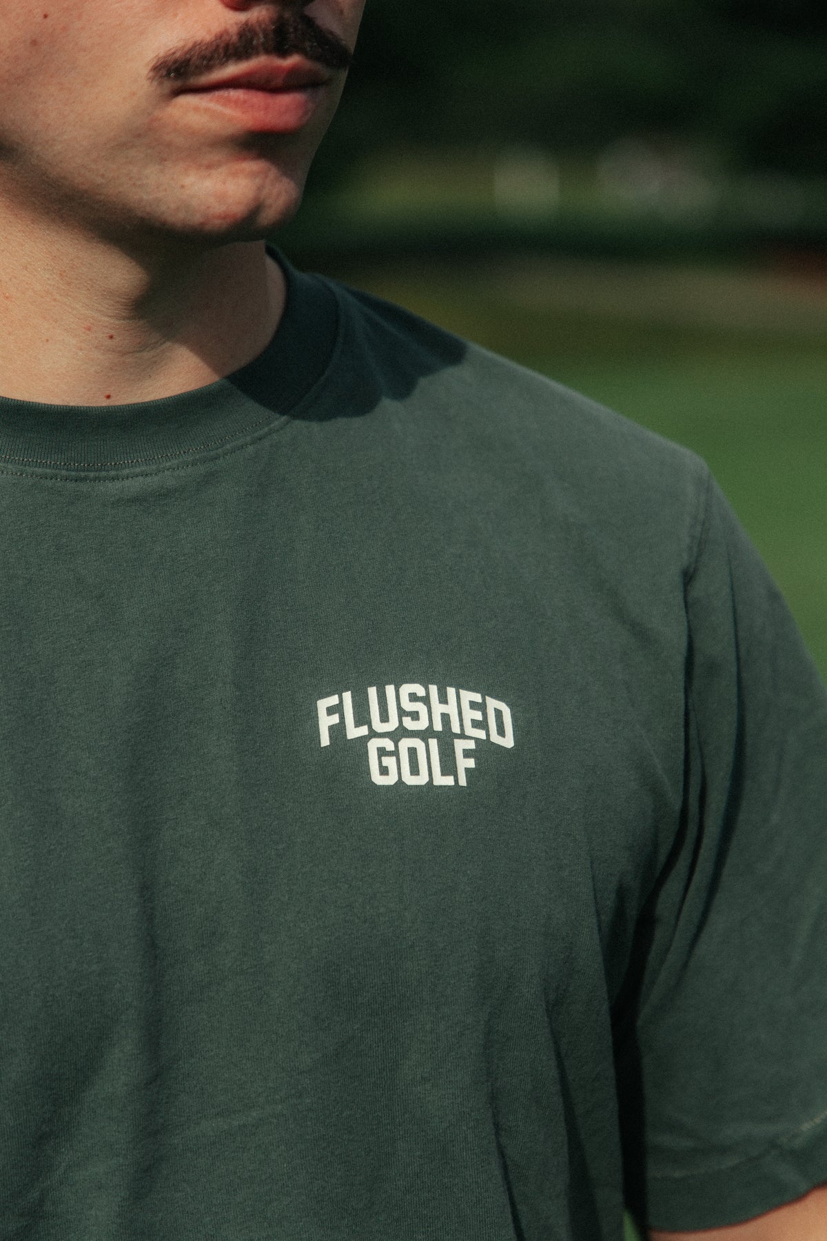 Flushed Golf Normalize Bogeys graphic tee in green